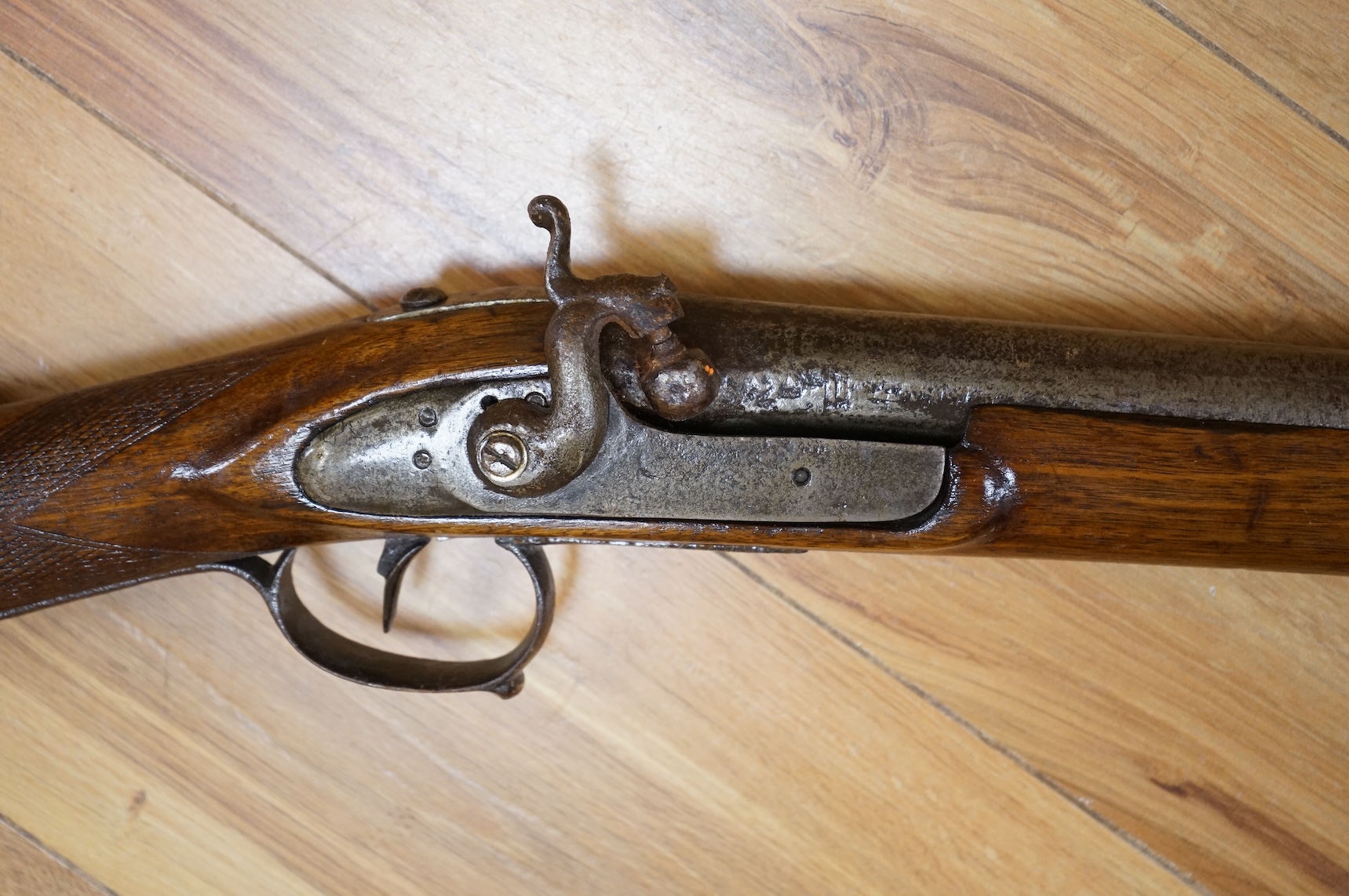 A Continental single barrel percussion sporting gun, barrel 106cm, half stocked with iron mounts and chequered grip